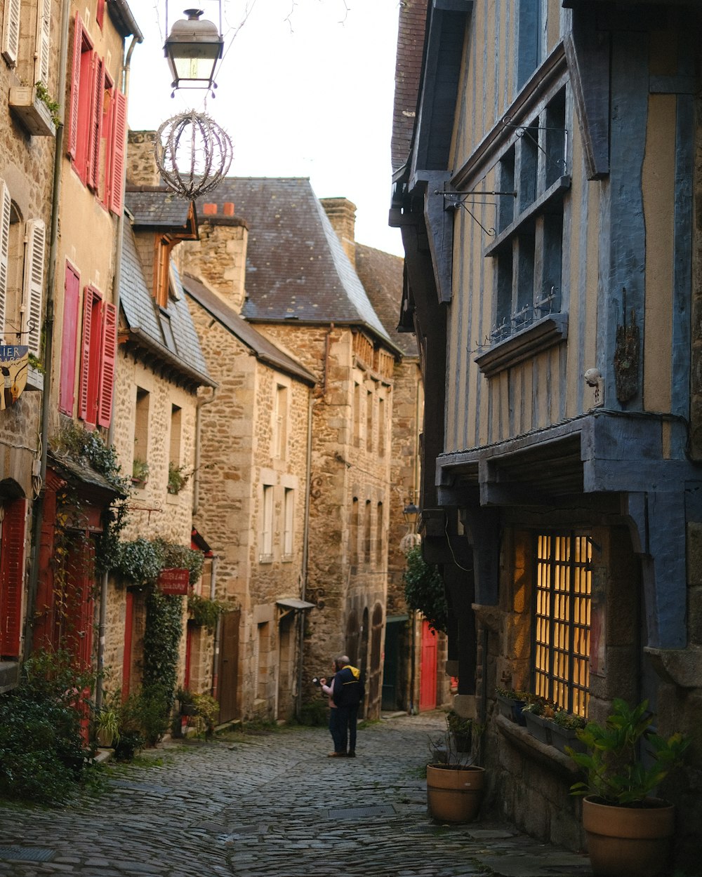 Old stone and timber houses along a narrow street
